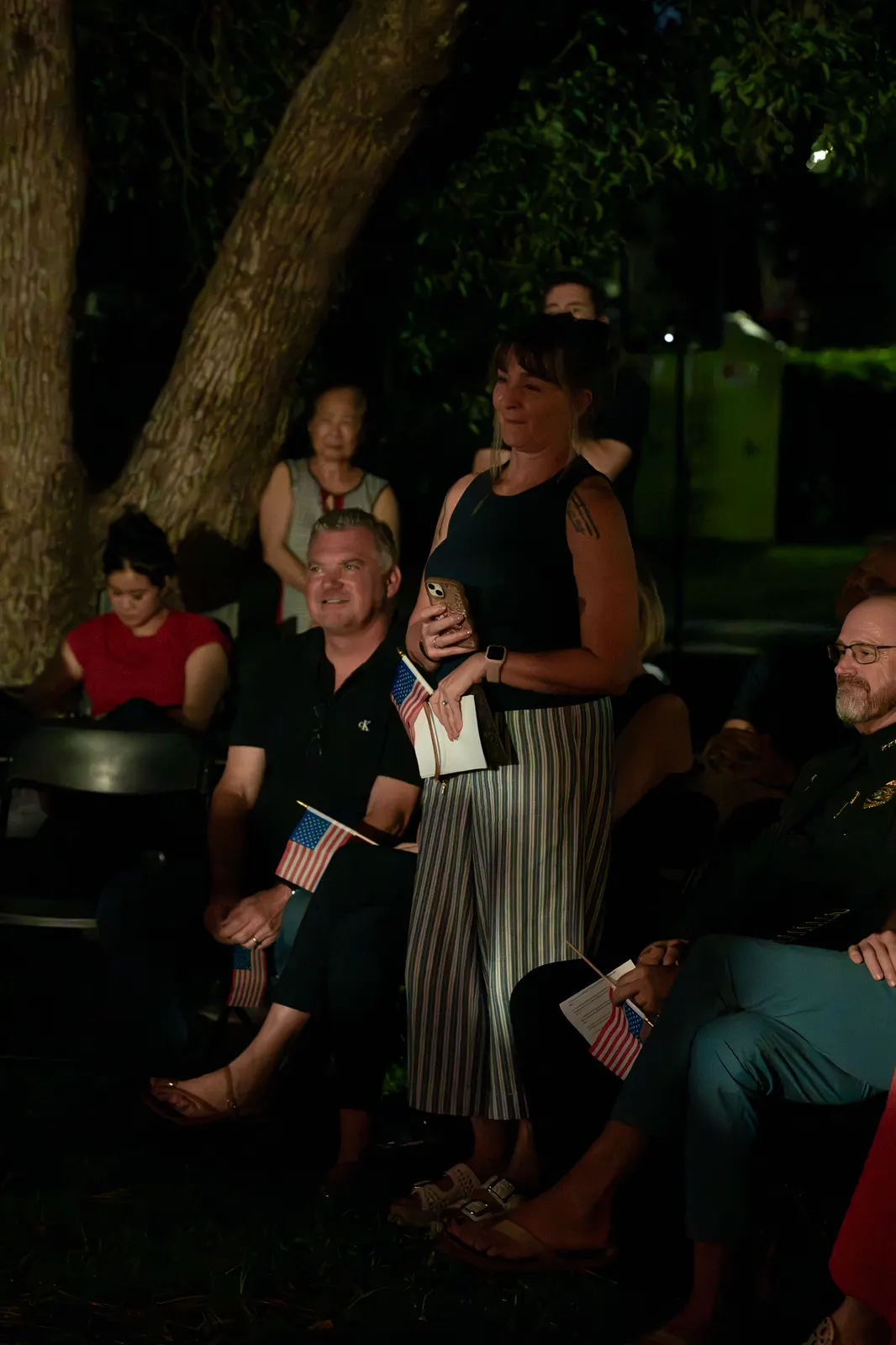 Audience members seated in the front rows watch the recognition ceremony.